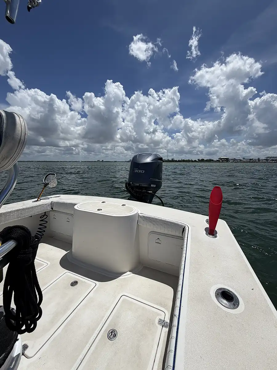 Aft fishing deck and outboard motor on a Sarasota fishing charter boat